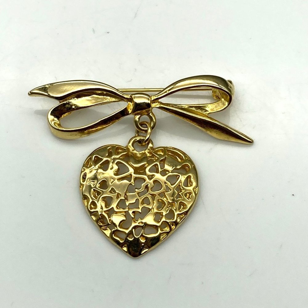 Elegant Vintage Bow Brooch with Dangling Pierced Heart Pendant, Love Lapel Pin
